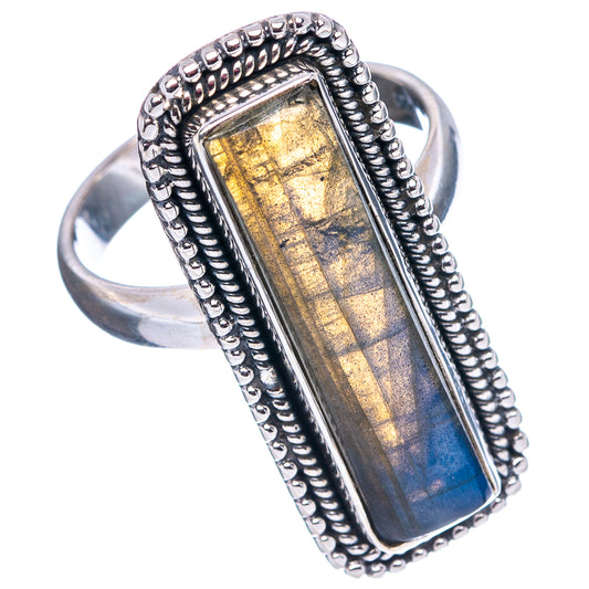 Rectangular labradorite ring with blue-and-gold iridescent stone, silver beaded bezel