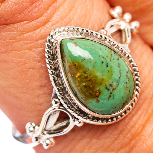 Sterling silver turquoise ring with oval green stone, ornate bezel and rope details