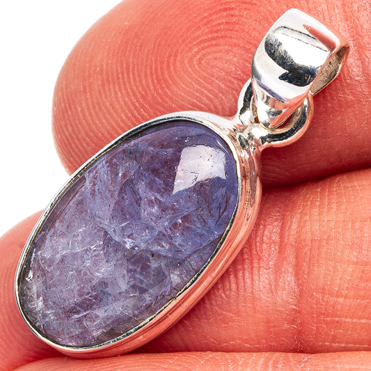 Oval tanzanite pendant in sterling silver with prong-set stone and hinged bail