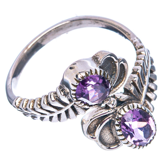 Sterling silver ring with two faceted amethyst stones and fan-style side details
