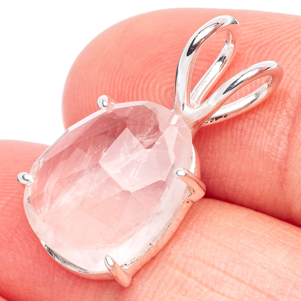 Rose quartz pendant with faceted teardrop stone and 925 sterling silver prong setting
