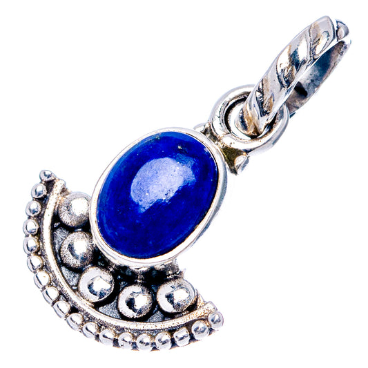 Lapis lazuli cabochon pendant with oval blue stone, decorative sterling silver frame