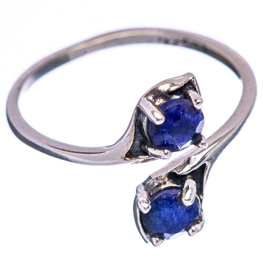 Size 6 sterling silver ring with two dark blue oval gemstones in claw settings