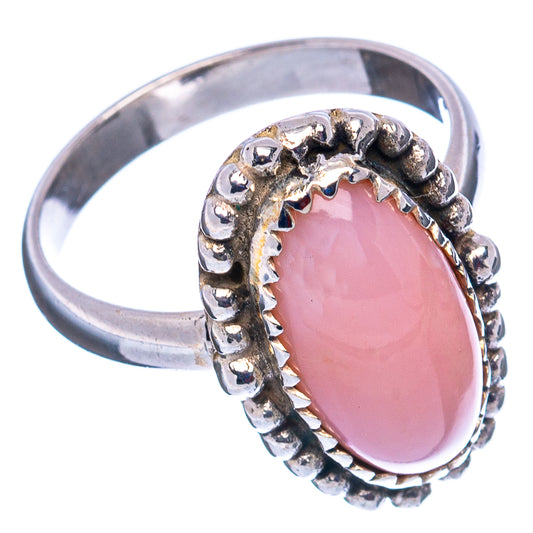 Pink oval gemstone ring on .925 sterling silver band with raised beaded edges