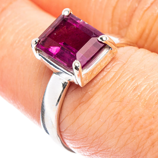 Pink faceted fluorite gemstone ring in .925 sterling silver, prong-set with side bands