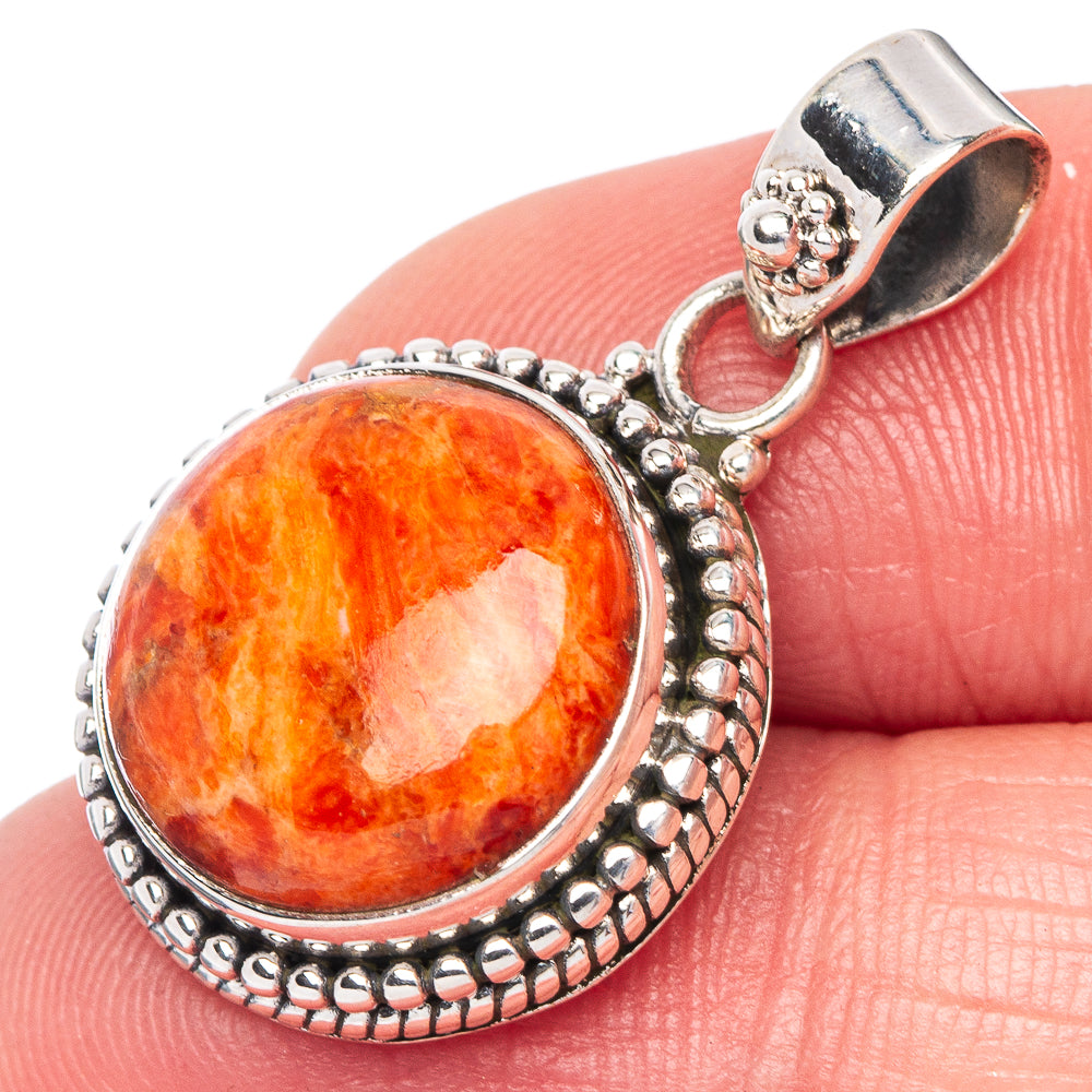 Sterling silver sponge coral pendant with round orange cabochon and bail loop