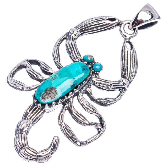 Turquoise scorpion pendant with elongated blue-green stone and small cabochons, silver