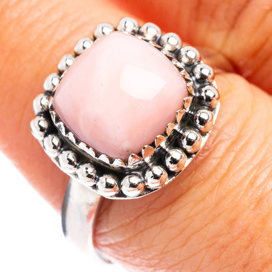 Pink opal gemstone ring with beaded sterling silver bezel, round pink stone.