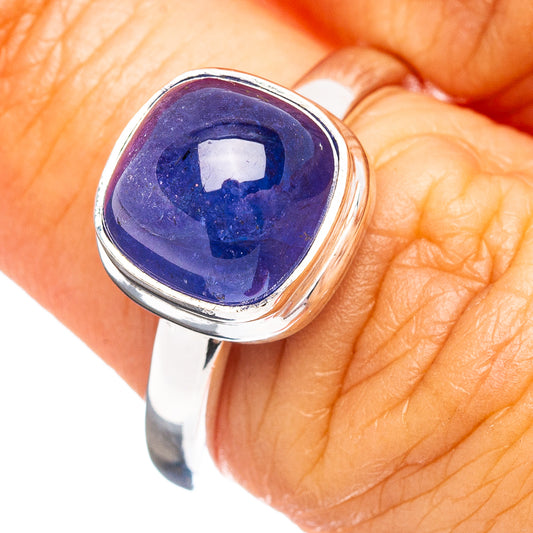 Sterling silver ring with oval dark blue-purple gemstone cabochon, size 7.