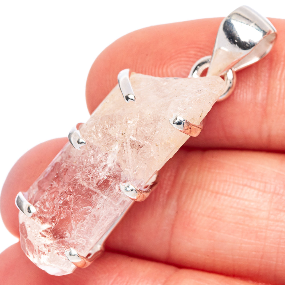Faceted danburite crystal pendant in sterling silver prong setting