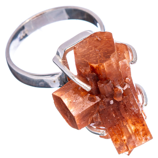 Sterling silver ring with orange aragonite crystal cluster and open band prongs