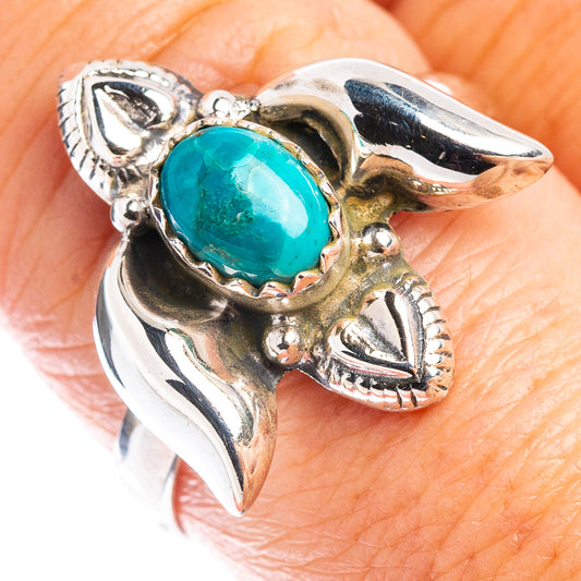 Sterling silver native-style ring with oval turquoise stone and engraved leaf details