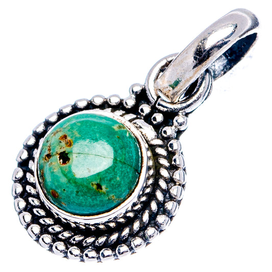 Sterling silver pendant with textured bezel around green cabochon and top loop