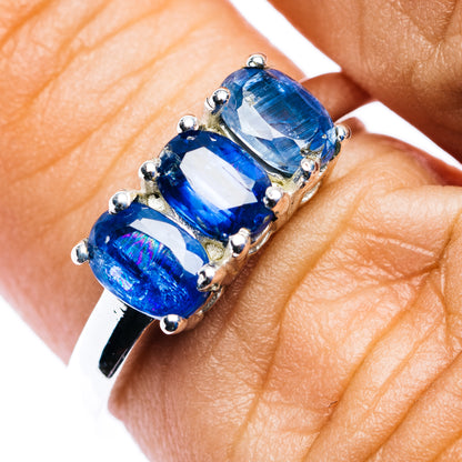 Three-stone kyanite ring, oval blue gems in sterling silver prongs