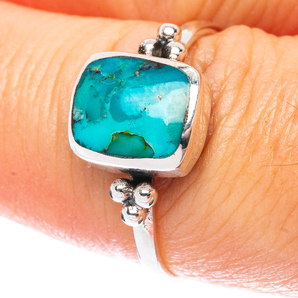 925 sterling silver turquoise cabochon ring with square cushion stone bezel on finger