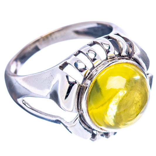 Sterling silver ring with yellow quartz cabochon and engraved band filigree detail
