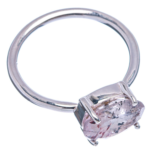 Sterling silver ring with prong-set oval speckled stone, polished band