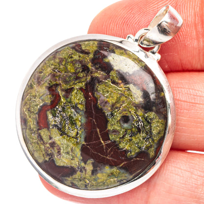 Sterling silver oval stone pendant with marbled dragon-blood red, green, and gold