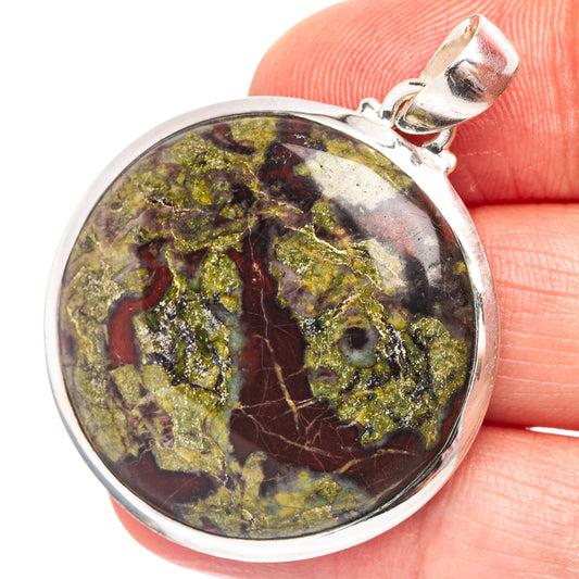 Sterling silver oval stone pendant with marbled dragon-blood red, green, and gold