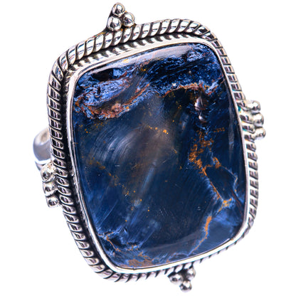 Sterling silver oval ring with blue pietersite cabochon and twisted rope bezel