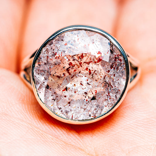 Lepidocrocite bezel ring in .925 sterling silver, round clear stone with red-orange flecks