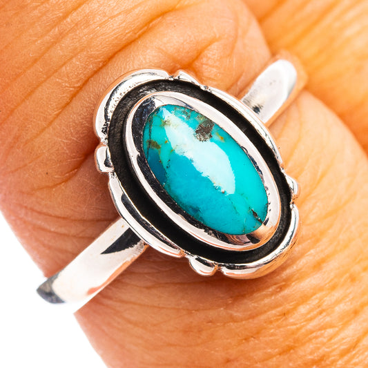 Oval turquoise cabochon sterling silver ring with black accents, size 8.5