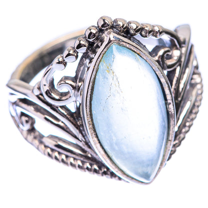 Silver aquamarine ring with pear-shaped bezel and decorative gallery band settings