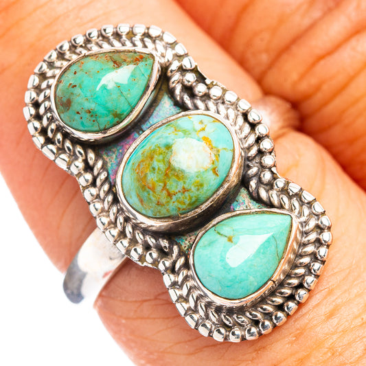 Sterling silver turquoise ring with three oval Mojave stones, bead bezel, adjustable band