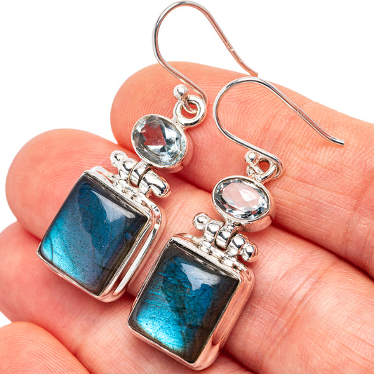 Silver hook earrings with blue labradorite rectangle stones, clear round accents, and frames