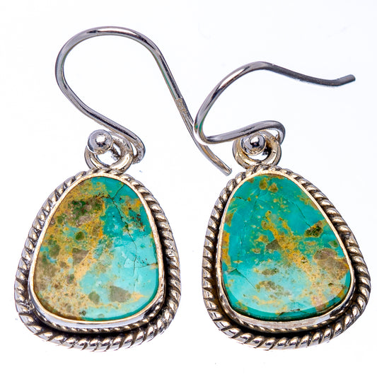 Turquoise oval drop earrings with ornate .925 sterling silver bezel and fishhook backs