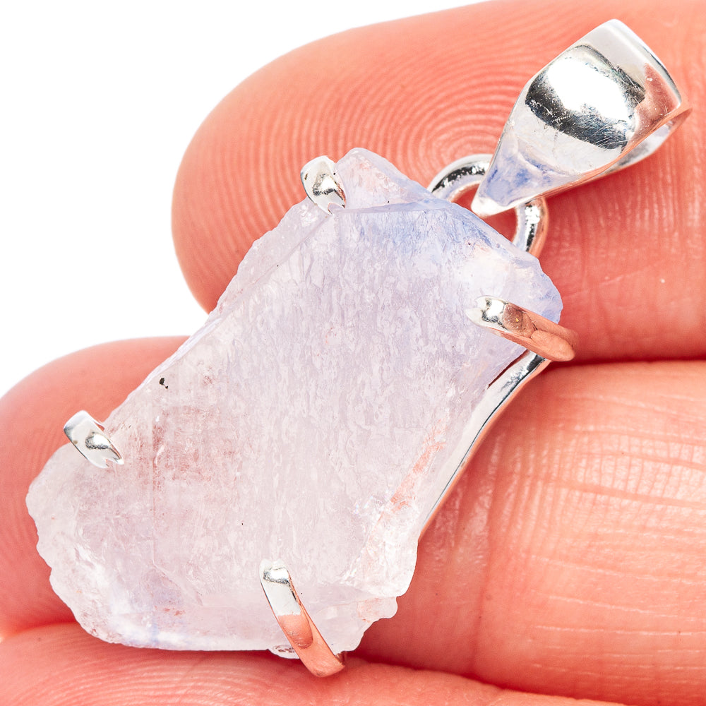 Sterling silver pendant with light blue rough mineral slice and open top bail