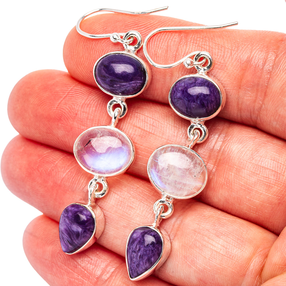 Sterling silver drop earrings with purple and pink stones, fishhook closure