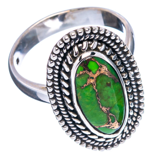 Sterling silver turquoise ring with oval green copper cabochon and rope-textured bezel