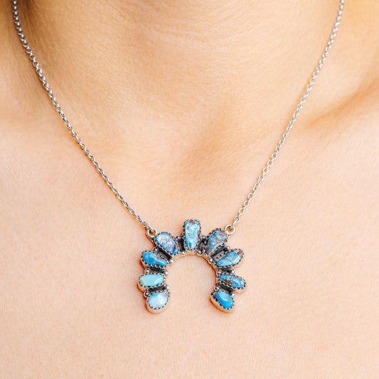 Sterling silver turquoise pendant necklace with flower-shaped blue stone cluster