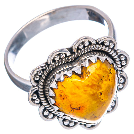 Heart-shaped amber-yellow jasper ring with scalloped silver band and filigree border