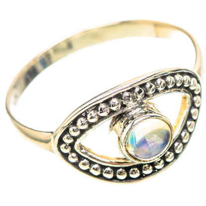 Sterling silver ring with oval rainbow moonstone in ornate teardrop setting