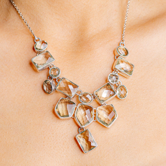 Sterling silver gemstone pendant necklace with faceted teardrop stones