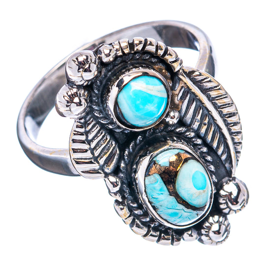 Silver Native-style ring with two turquoise oval cabochons and ornate side details