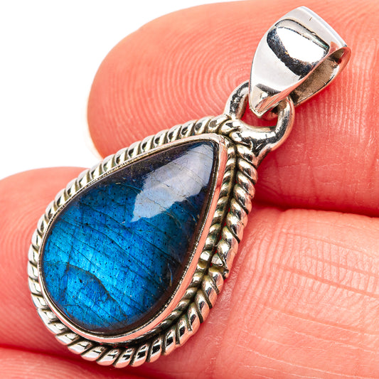 Labradorite pendant with oval blue stone, sterling silver bezel and rope border
