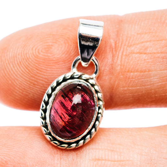 Pink tourmaline oval pendant in .925 sterling silver setting, textured bezel