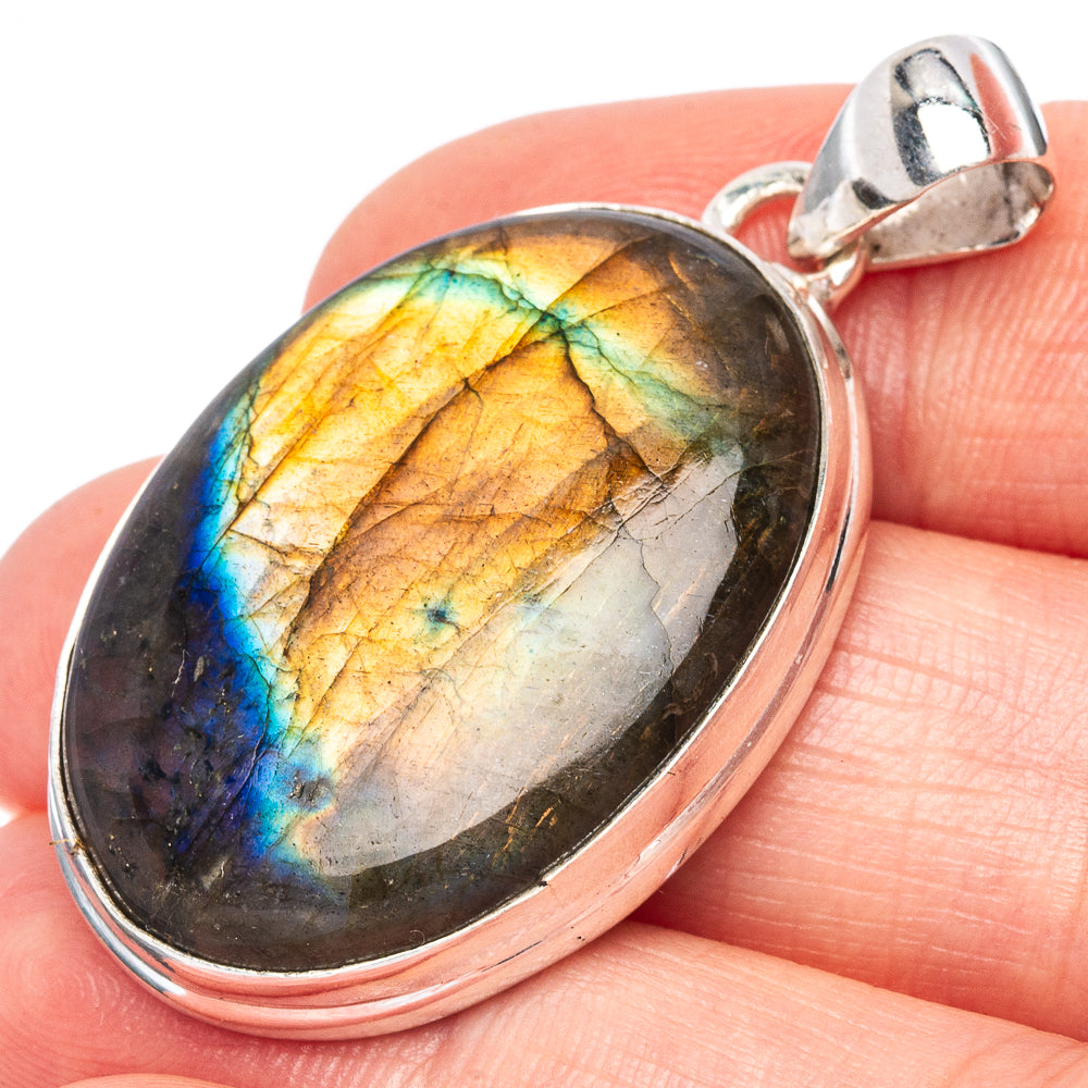 Oval labradorite gemstone pendant in 925 sterling silver bezel with prong bail