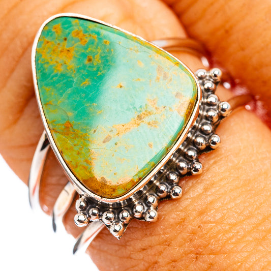 Sterling silver ring with oval turquoise cabochon and beaded border, size 8