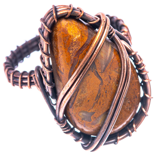 Oxidized copper wire ring with oval amber-brown jasper centerpiece