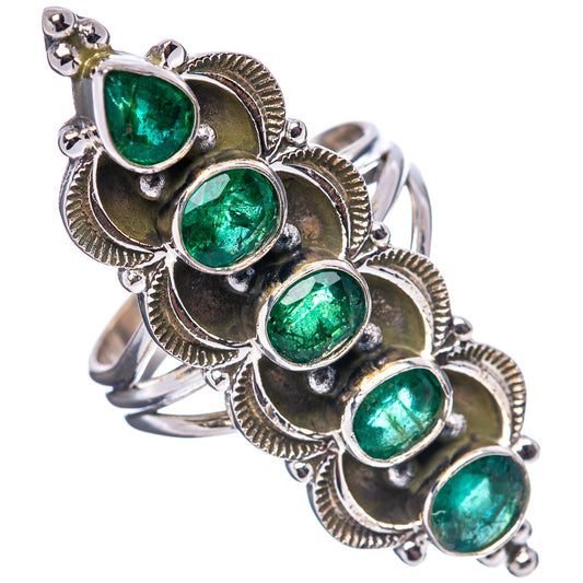Ornate oval green emerald ring with five bezel-set stones on sterling silver band