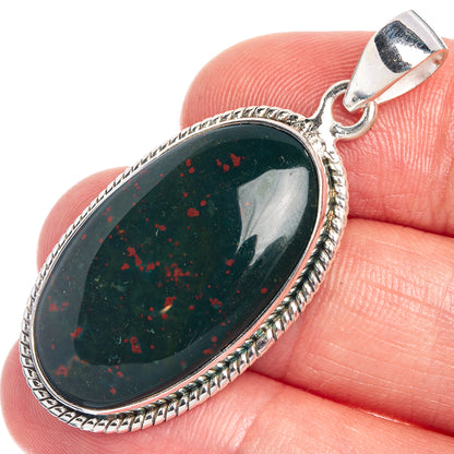 Oval dark green bloodstone pendant in 925 sterling silver with rope bezel and bail