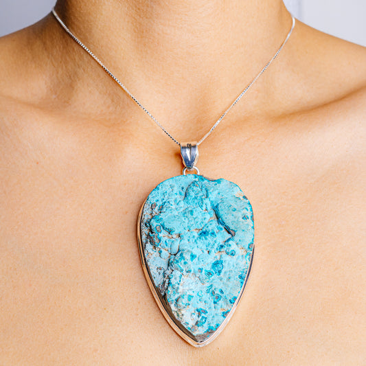 Sterling silver chrysocolla pendant with blue teardrop gemstone