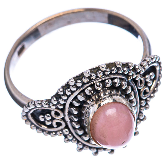 Pink opal ring showing oval stone and beaded sterling silver scrolling band