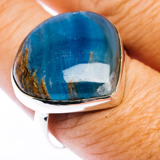 Sterling silver ring with teardrop blue cabochon gemstone, polished silver bezel