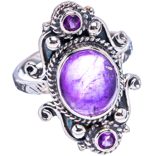 Sterling silver amethyst ring, oval centerpiece with three purple gemstone accents