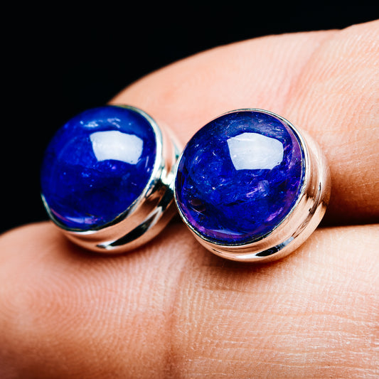 Blue tanzanite cabochon stud earrings with rounded .925 sterling silver bezel rims